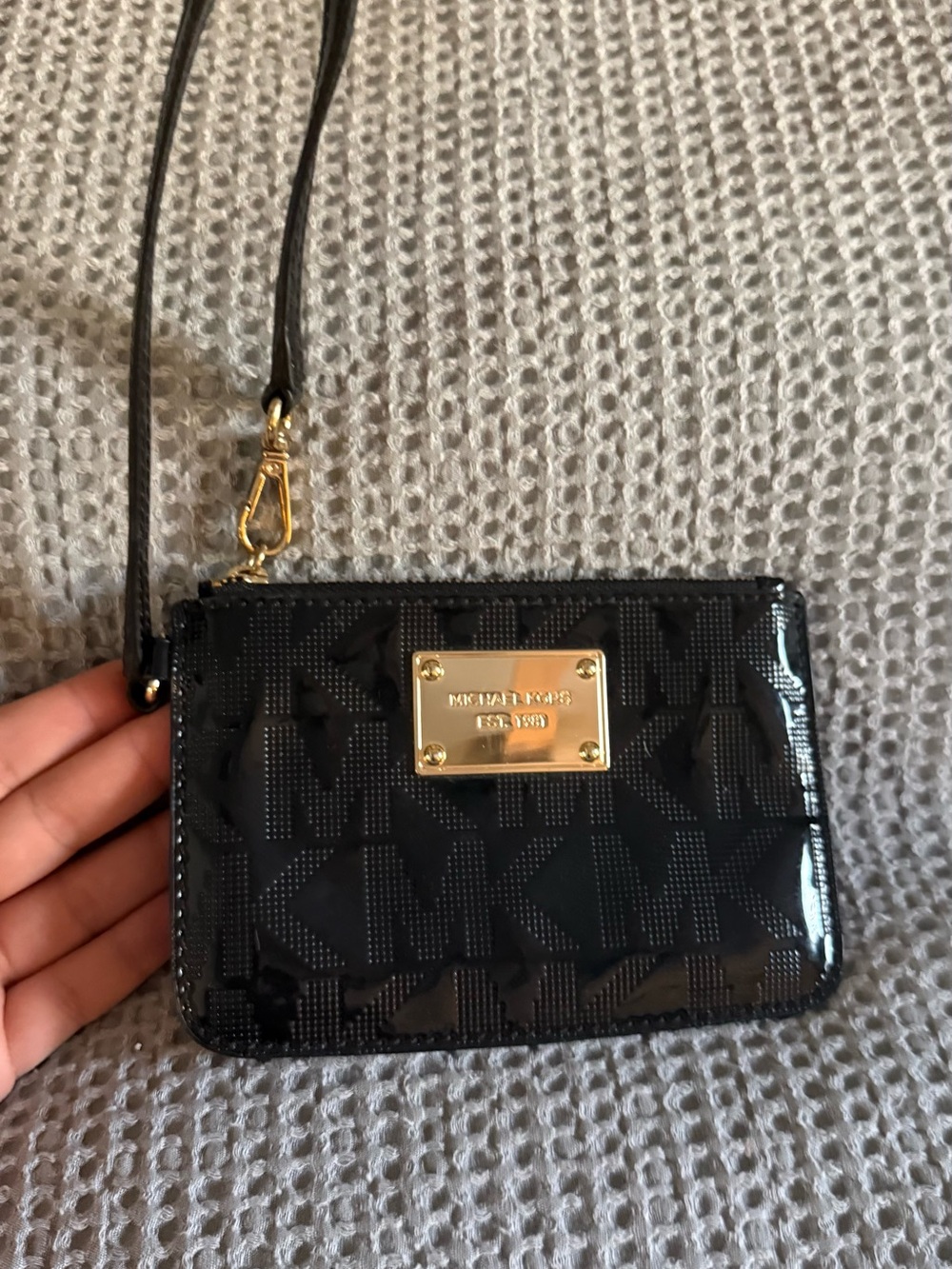 Michael Kors Black Patent Logo Wristlet with Gold Plate
